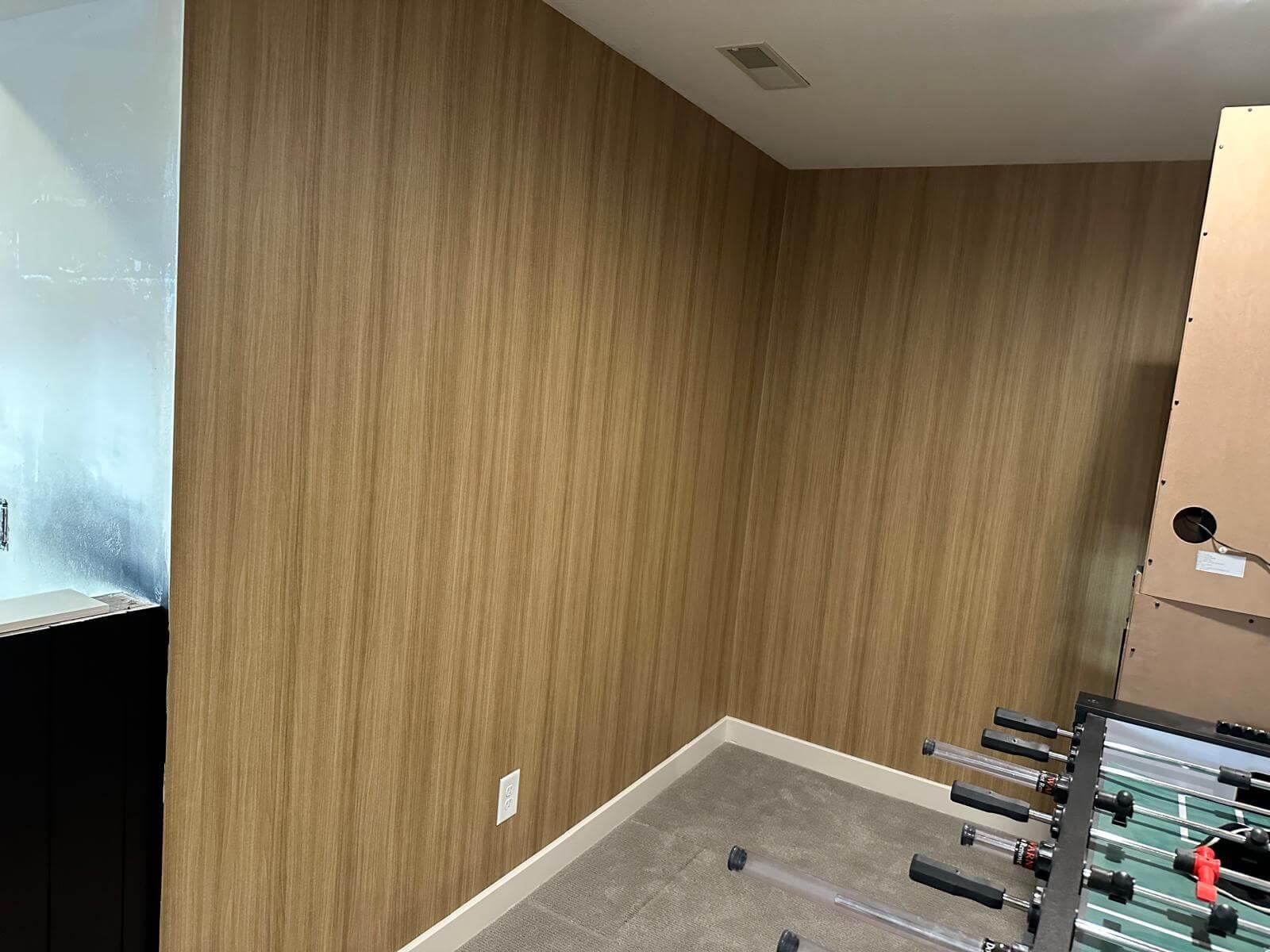 Vertical wood pattern wallpaper on walls.